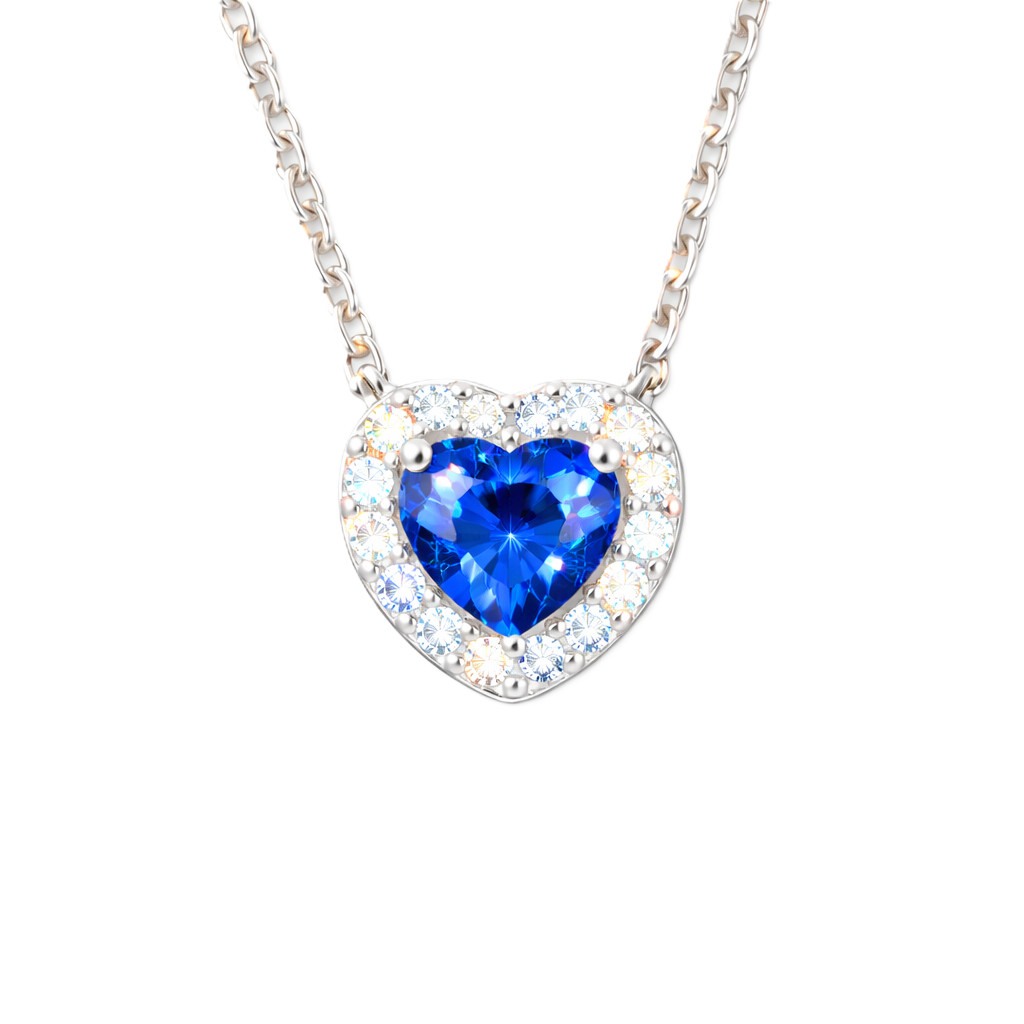 Blue sapphire heart pendant with 6 mm center stone in white gold-plated 925 silver. Elegant and timeless for daily wear. Available now at BSI Jewelry.