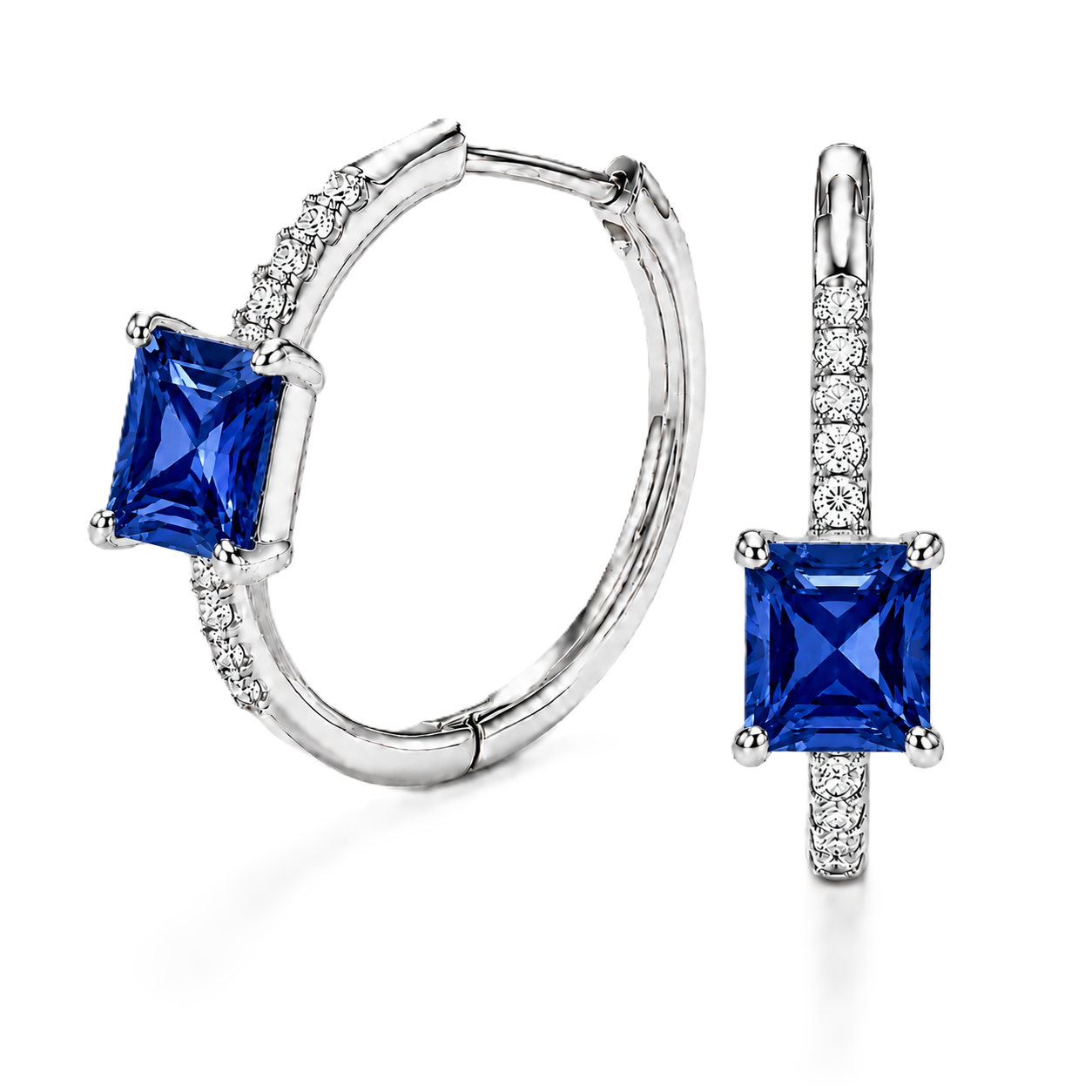 Blue sapphire huggie earrings featuring vibrant 5 mm square blue sapphires and sparkling accents in white gold plated 925 silver. Available now at BSI Jewelry.