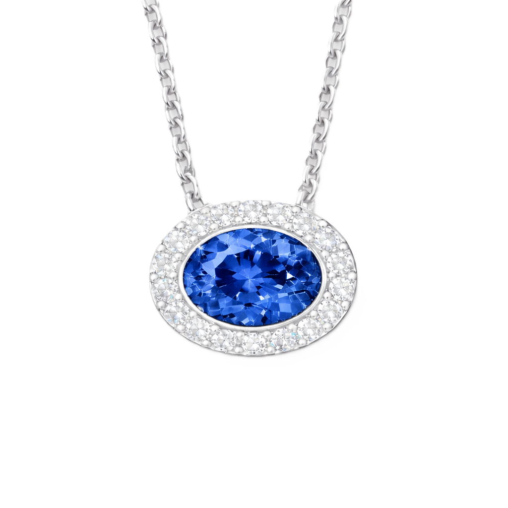 Blue sapphire necklace with a 7×5 mm oval stone in white gold-plated 925 silver, accented with moissanite. Elegant and timeless. Available now at BSI Jewelry.