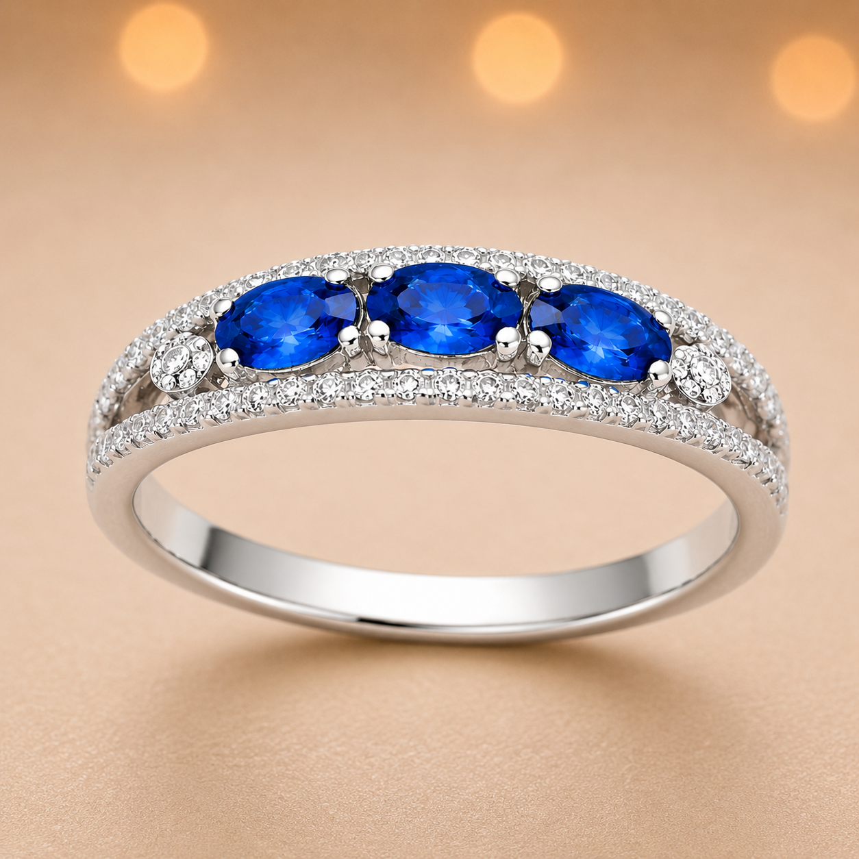 Blue sapphire ring with 5×3 mm oval stones in white gold-plated 925 silver. Classic, elegant, and hypoallergenic. Available now at BSI Jewelry.