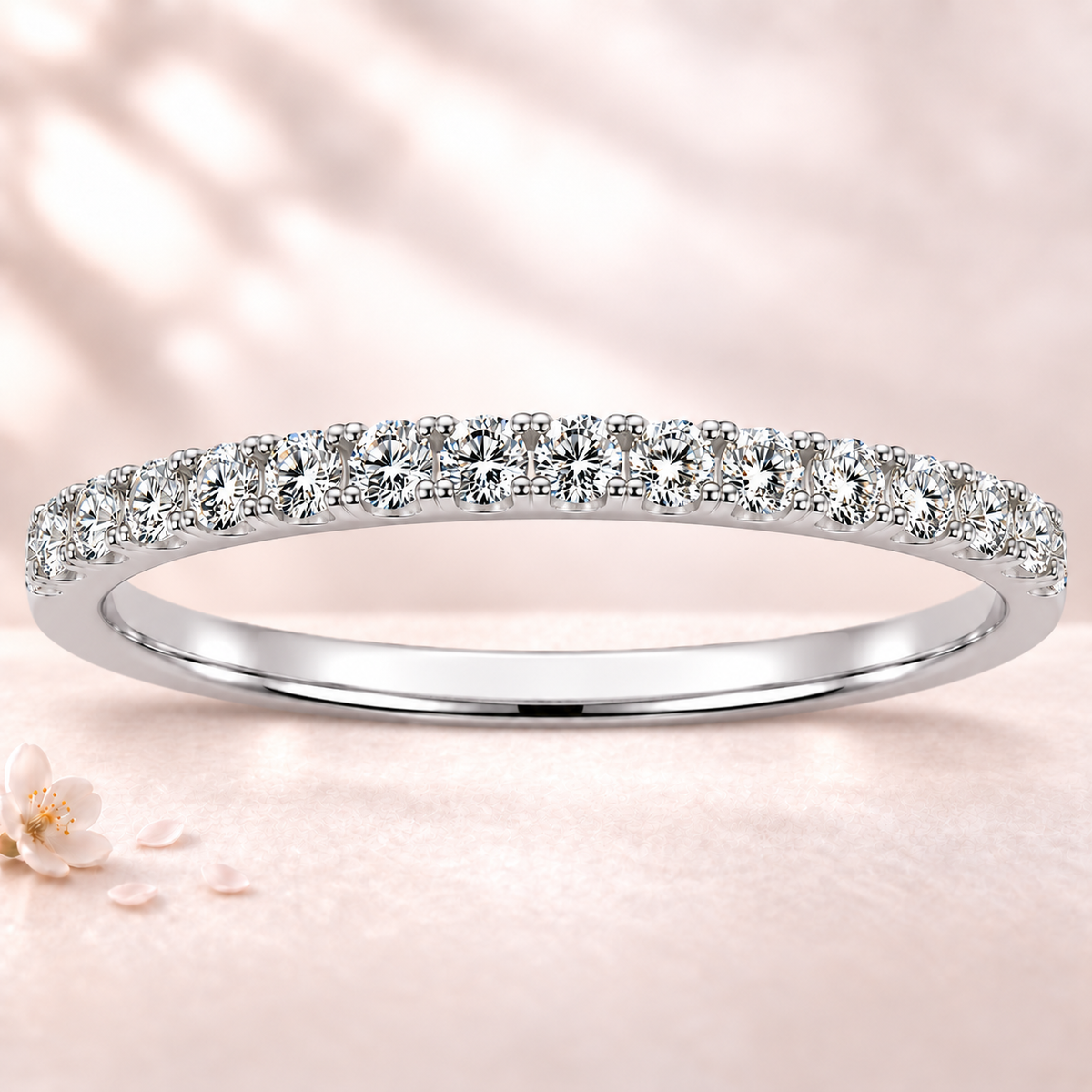 Round moissanite wedding band crafted in white gold-plated 925 silver. Elegant brilliance and timeless sparkle for everyday wear. Available now at BSI Jewelry.