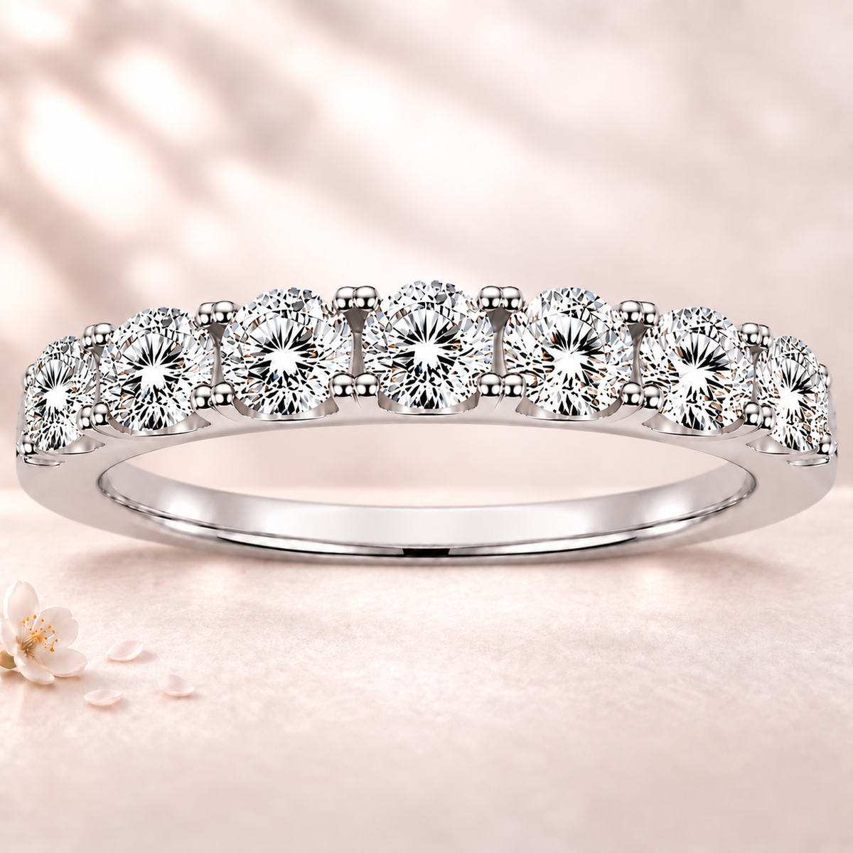 Round moissanite wedding band crafted in white gold-plated 925 silver. Elegant brilliance and timeless sparkle for everyday wear. Available now at BSI Jewelry.
