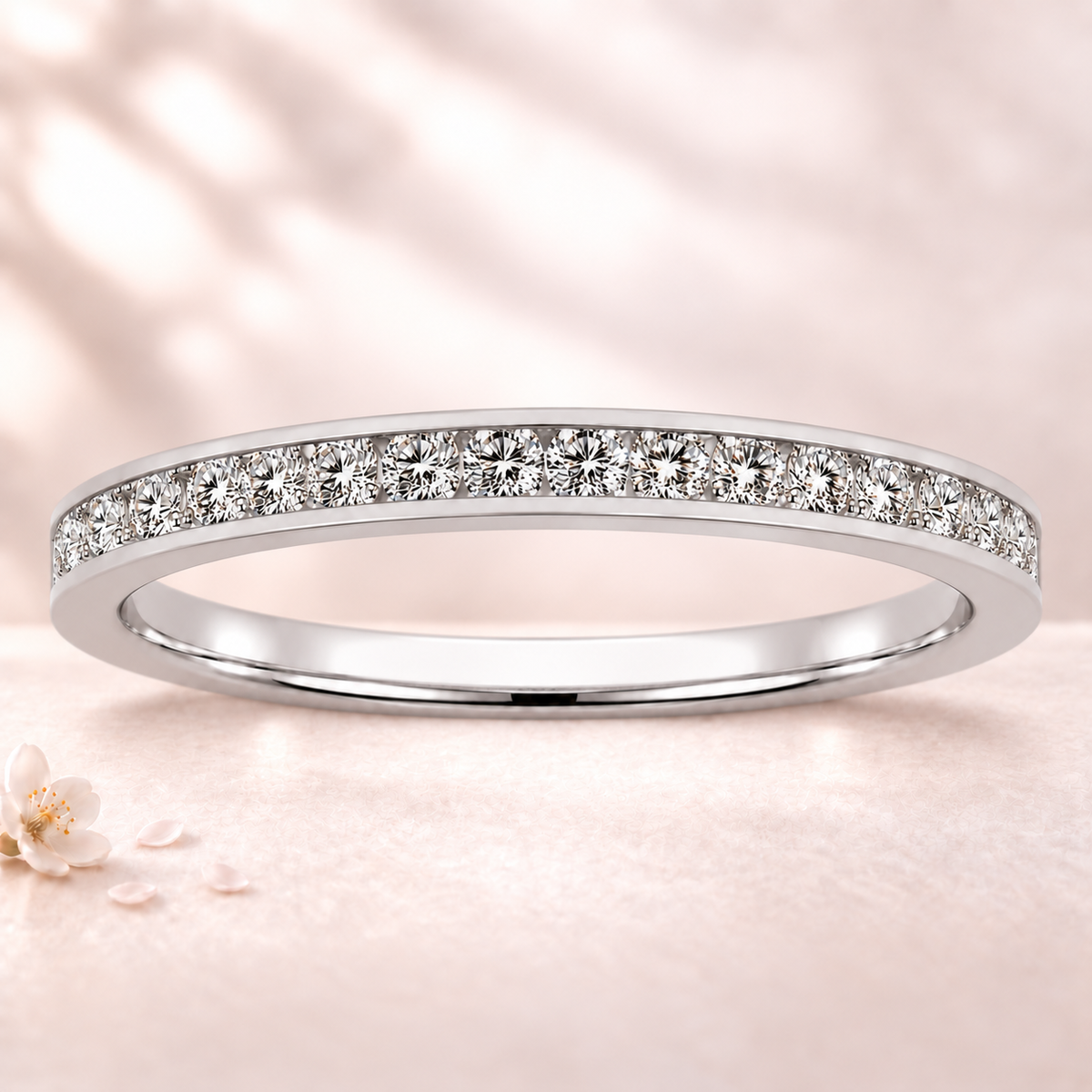 Round moissanite wedding band crafted in white gold-plated 925 silver. Elegant brilliance and timeless sparkle for everyday wear. Available now at BSI Jewelry.