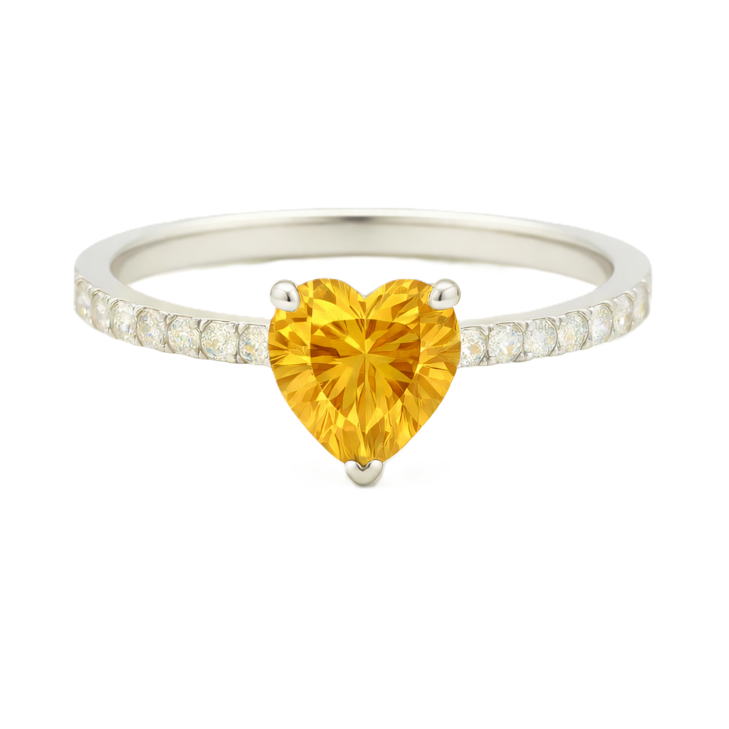 Citrine ring with a 6 mm heart-cut in white gold-plated 925 silver, accented with moissanite. Romantic and elegant for daily wear. Available now at BSI Jewelry.