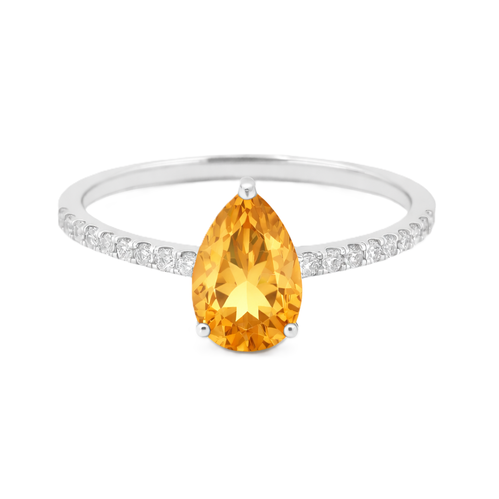 Citrine ring with a 7×5 mm pear-cut stone and moissanite accents in white gold plated 925 silver. Elegant for daily wear. Available now at BSI Jewelry.