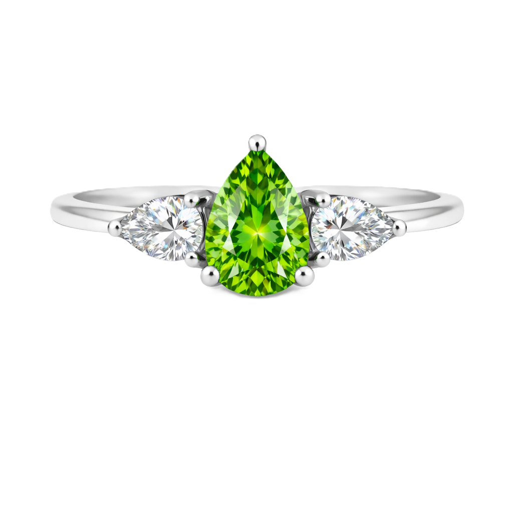 Green sapphire ring with 7×5 mm pear center and side stones in white gold-plated 925 silver. Bright and elegant for daily wear. Available now at BSI Jewelry.