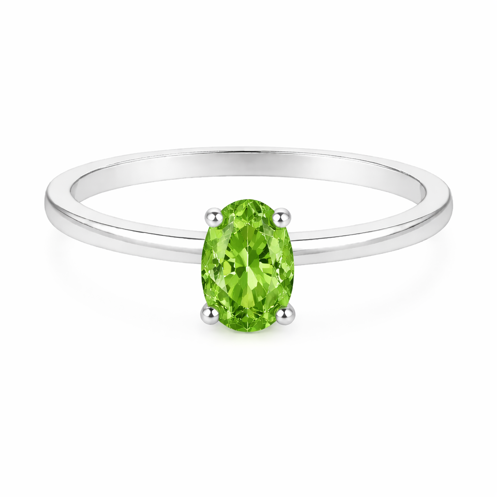 Green sapphire solitaire ring with a 6×4 mm oval in white gold-plated 925 silver. Elegant, minimal, and timeless for daily wear. Available now at BSI Jewelry.