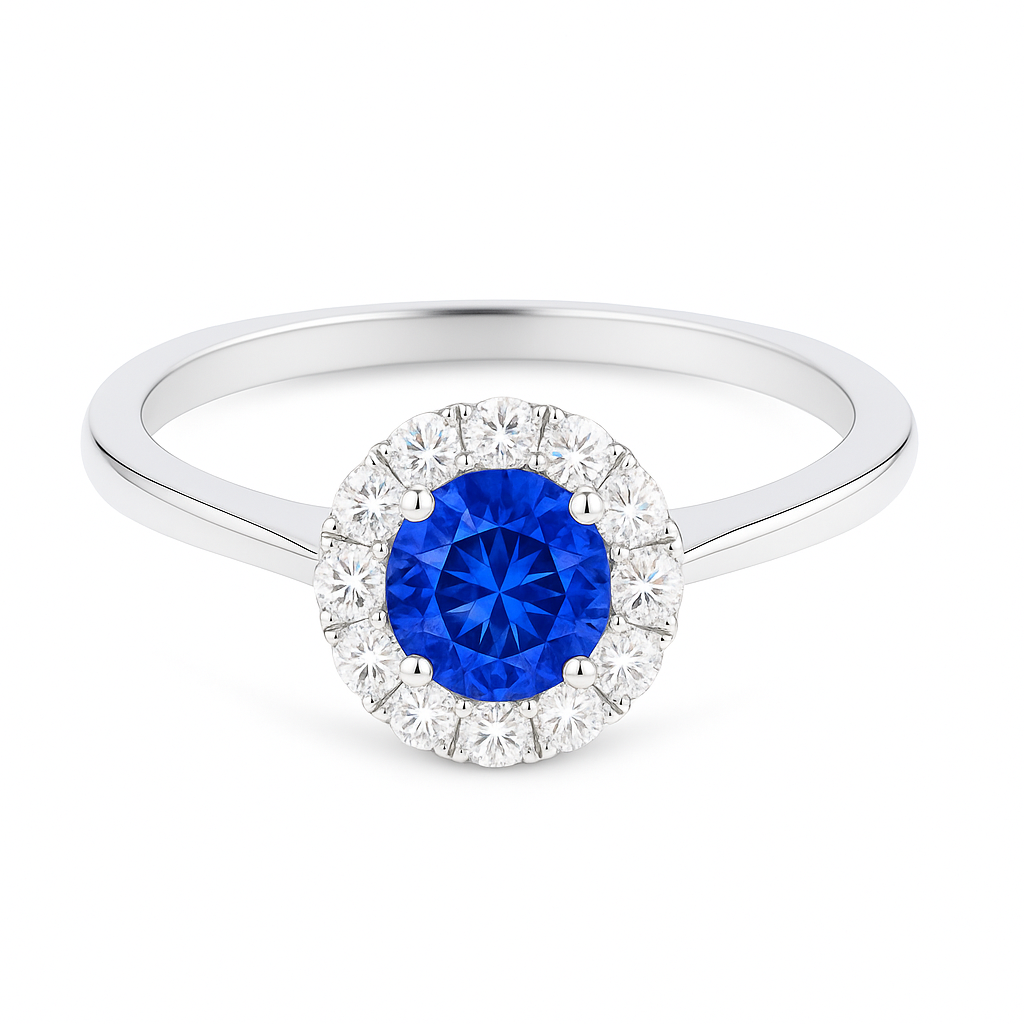 4.3 mm blue sapphire halo ring with white Moissanite in white gold-plated hypoallergenic 925 silver. Brilliant, elegant, timeless. Available now at BSI Jewelry.