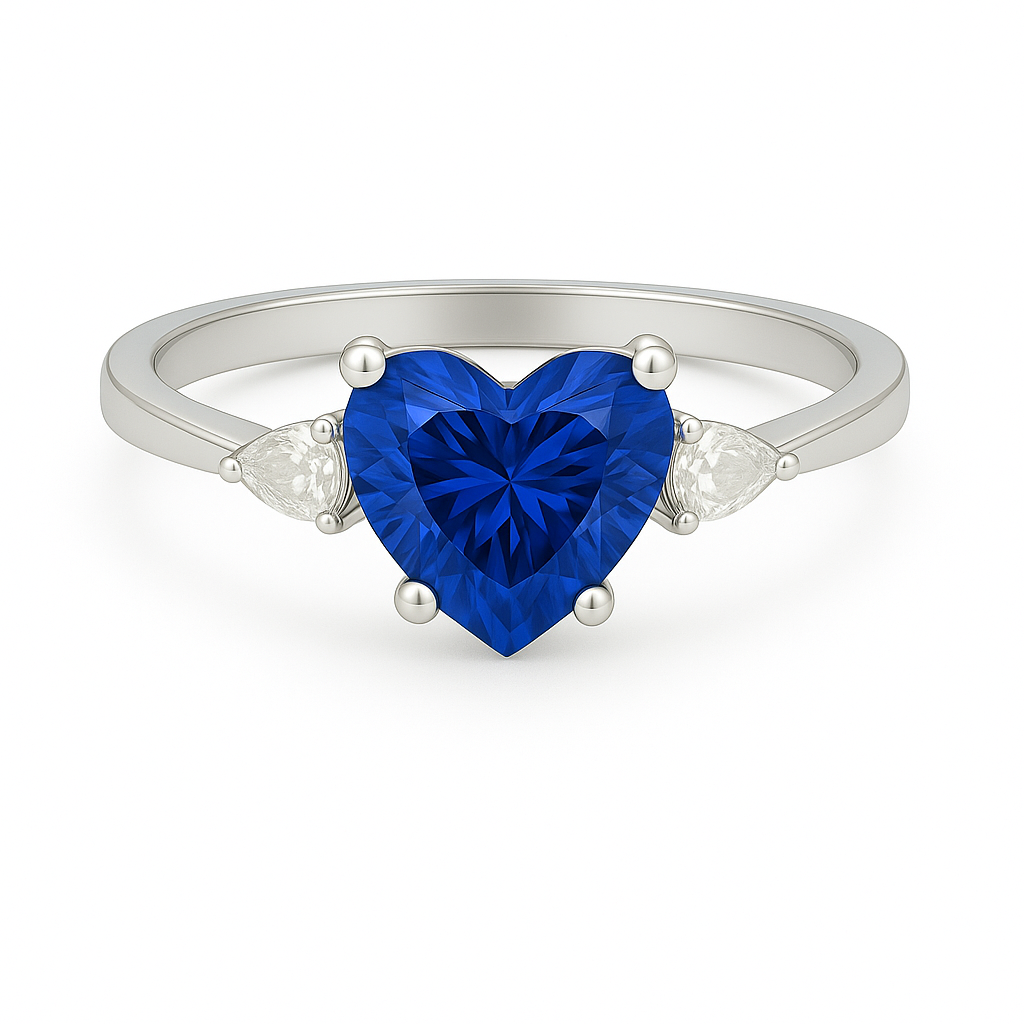 6 mm heart-cut blue sapphire ring with pear-shaped Moissanite accents, set in white-gold-plated 925 silver. Romantic and charming. Available now at BSI Jewelry.