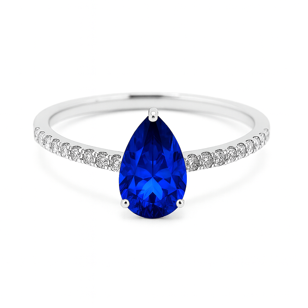7×5 mm pear blue sapphire ring with Moissanite on white gold-plated 925 silver. Elegant, radiant, and hypoallergenic. Available now at BSI Jewelry.