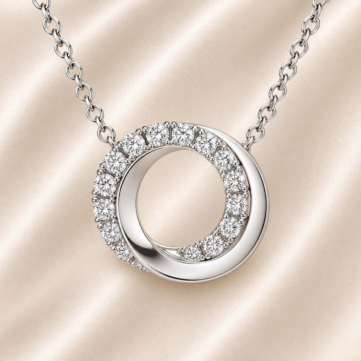 Modern Moissanite double circle necklace in 925 silver, featuring half pavé brilliance and half polished finish. A sleek design. Available now at BSI Jewelry.