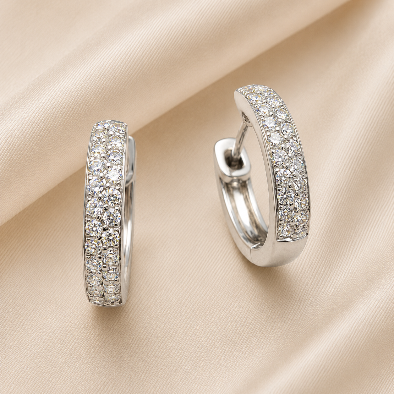 Moissanite double row huggie earrings in 925 silver, pavé-set for radiant brilliance. A versatile design that adds sparkle to any style. Now at BSI Jewelry.
