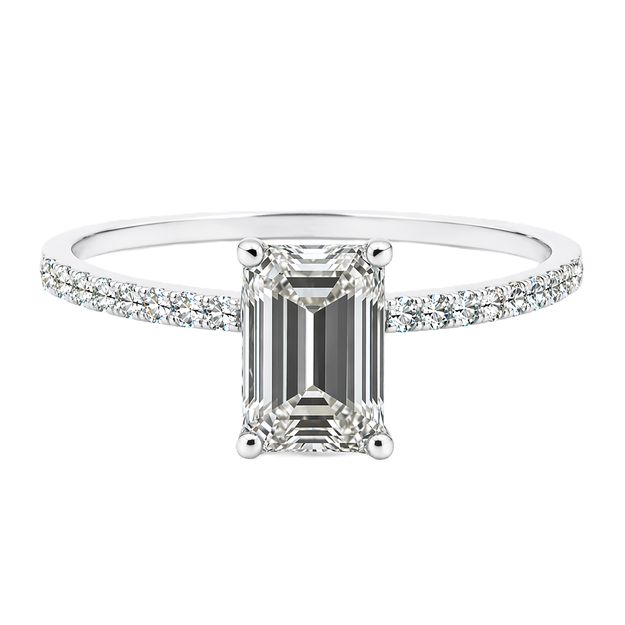 Moissanite emerald ring with a 7×5 mm emerald-cut stone, accented by moissanite in white gold-plated 925 silver. Sleek and elegant. Available now at BSI Jewelry.