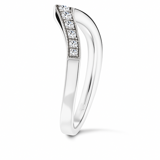 Vintage-inspired Moissanite V-shaped wedding band in 925 silver with milgrain detail. Channel-set brilliance and timeless elegance. Available at BSI Jewelry.