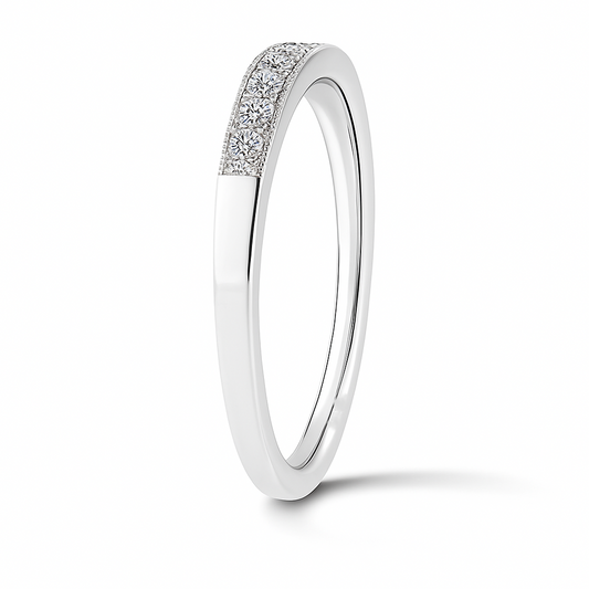Classic Moissanite wedding band in 925 silver with brilliance and milgrain detail. Finely crafted, hypoallergenic, and timelessly elegant. Now at BSI Jewelry.