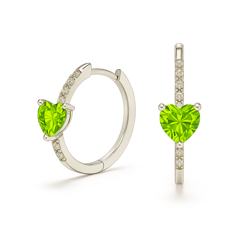 Heart-cut Peridot huggie earrings in white-gold-plated 925 silver with sparkling Moissanite accents for vibrant green brilliance. Available now at BSI Jewelry.