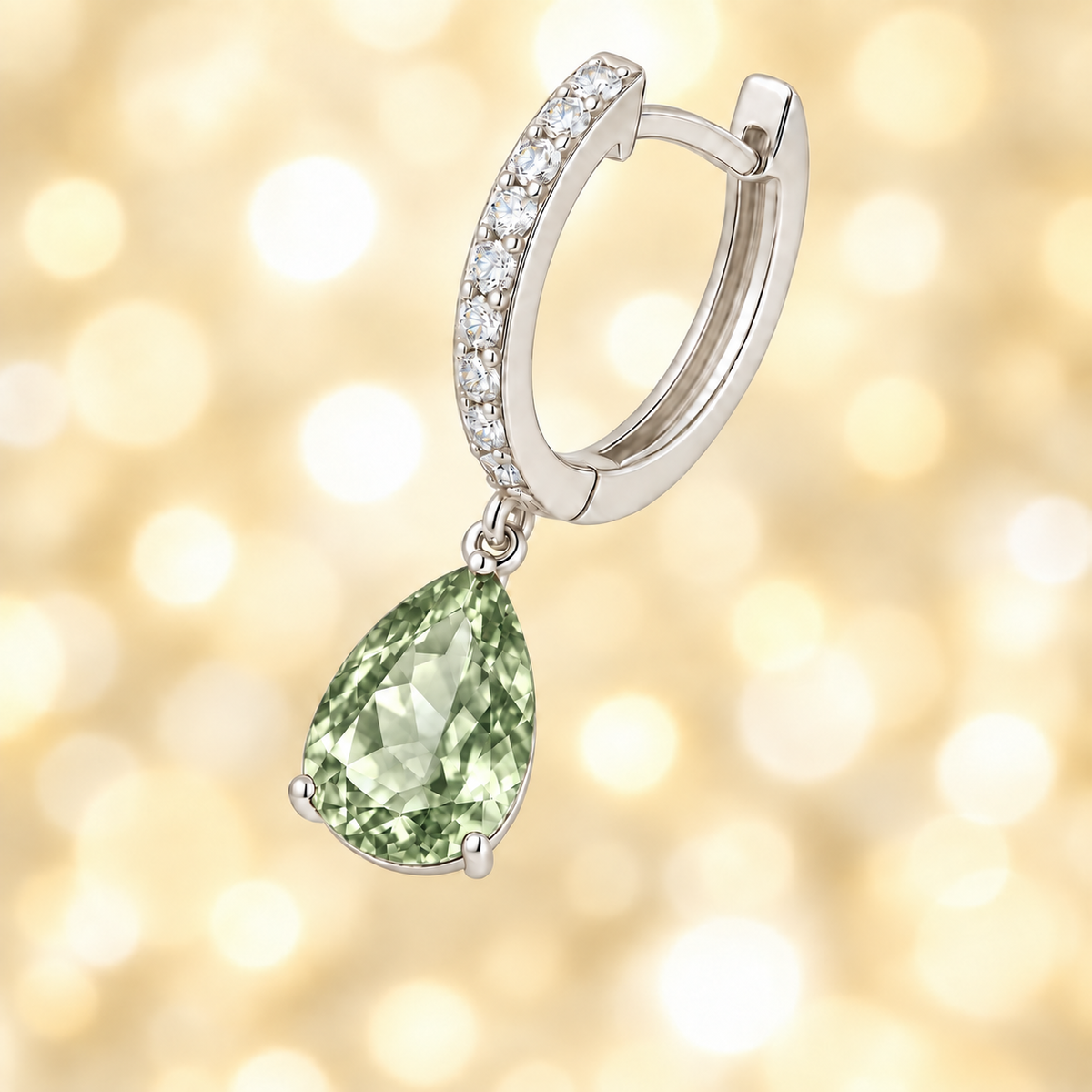 Moissanite & Prasolite Huggie Earrings, 8×5 mm pear cut, crafted in white gold-plated 925 silver. Elegant and hypoallergenic. Available now at BSI Jewelry.