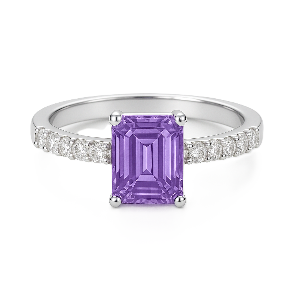 7×5mm emerald-cut Purple Sapphire ring with Moissanite accents in white-gold-plated 925 silver. Elegant, radiant, and hypoallergenic. Available at BSI Jewelry.