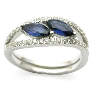 Stylish twin-sapphire ring in white gold-plated 925 silver, accented with sparkling Moissanite. Brilliant and hypoallergenic. Available now at BSI Jewelry.