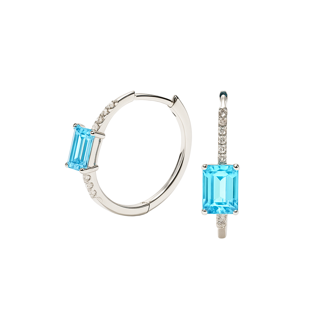 Bright sky blue topaz and Moissanite huggie earrings with 6×4 mm emerald-cut stones in white gold-plated 925 silver. Hypoallergenic comfort. Now at BSI Jewelry.