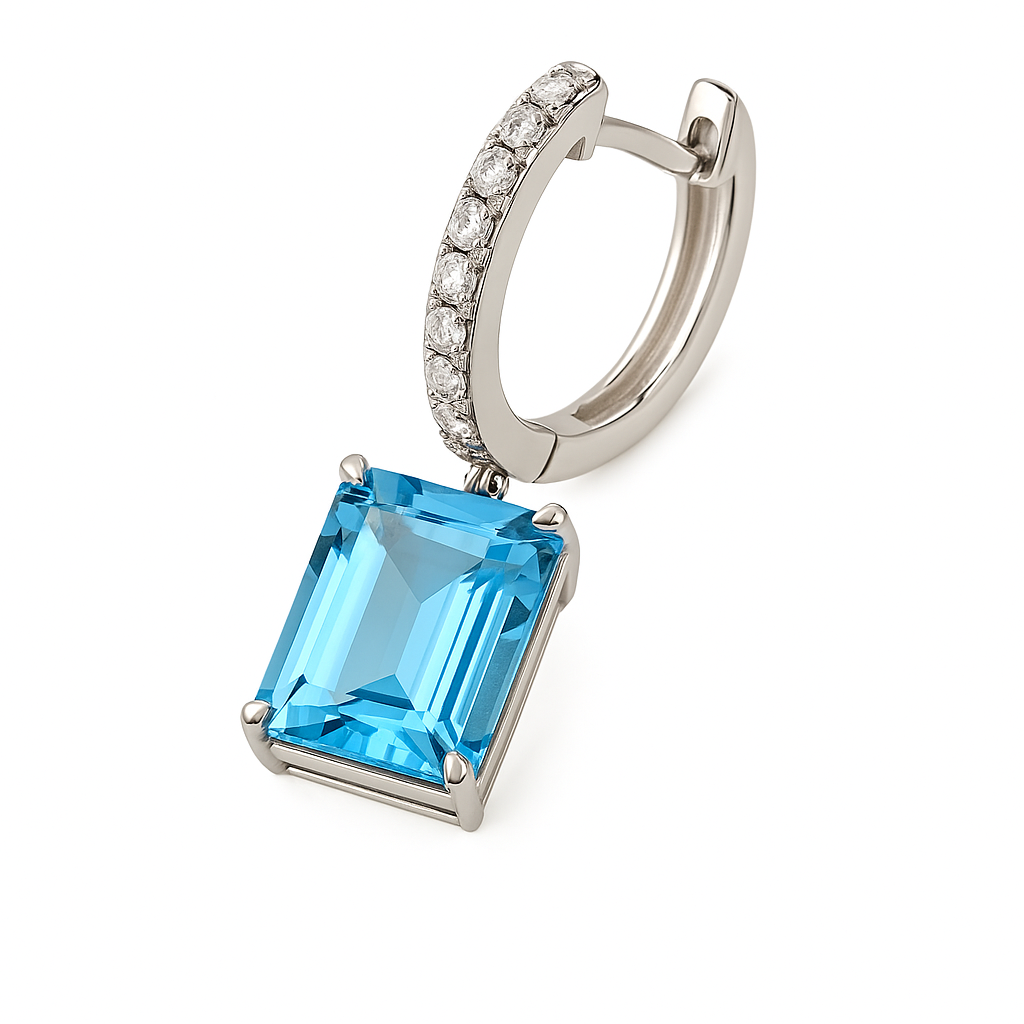 Moissanite & Sky Blue Topaz Huggie Earrings, 8×6 mm emerald cut, crafted in white gold-plated 925 silver. Elegant and hypoallergenic. Available at BSI Jewelry.