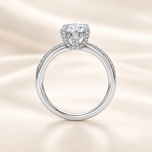 1.00 carat Moissanite solitaire engagement ring with pave-set band in white-gold-plated 925 silver. Elegant and timeless charm. Available now at BSI Jewelry.