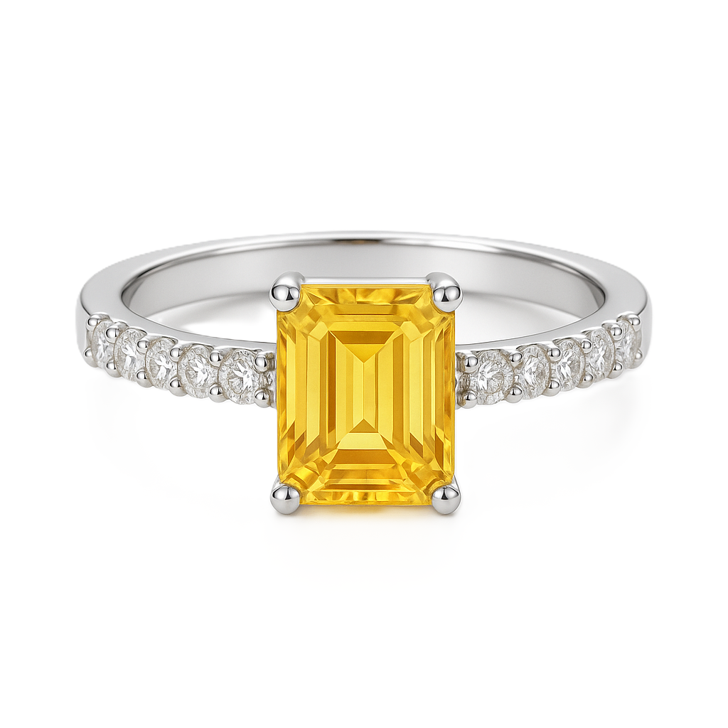 7×5mm emerald-cut Yellow Sapphire engagement ring with Moissanite accents in white-gold-plated 925 silver. Elegant and hypoallergenic. Available at BSI Jewelry.