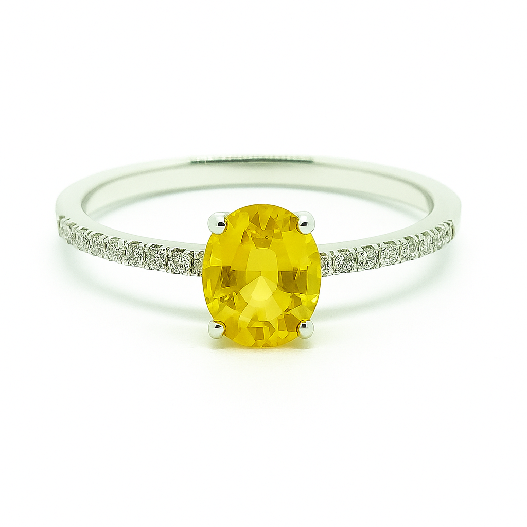 Elegant yellow sapphire engagement ring in white gold-plated 925 silver, accented with Moissanite. Brilliant and hypoallergenic. Available now at BSI Jewelry.