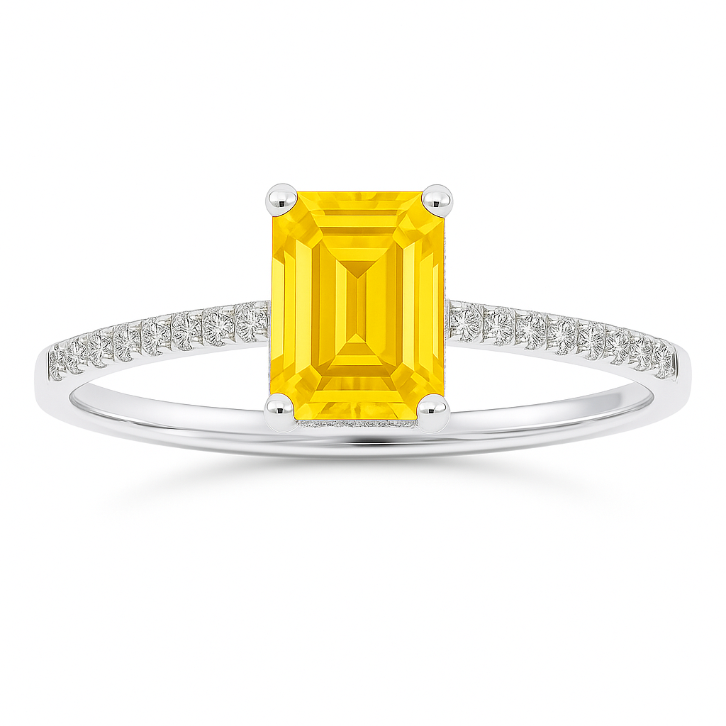 Emerald-cut 7×5 mm yellow sapphire ring with Moissanite on white gold-plated 925 silver. Elegant, radiant, and hypoallergenic. Available now at BSI Jewelry.