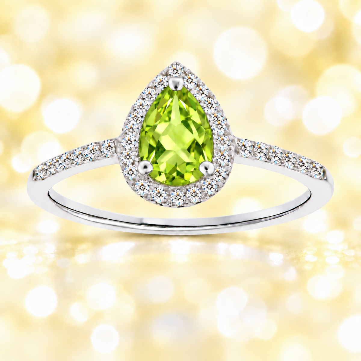 Peridot ring with a 7×5 mm pear cut, with moissanite in white gold-plated 925 silver. Elegant and timeless for daily wear. Available now at BSI Jewelry.