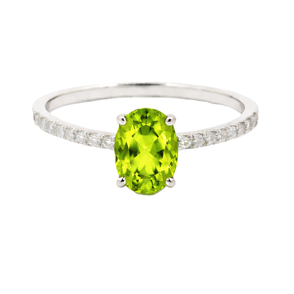 Peridot ring with a 7×5 mm oval-cut stone and moissanite accents in white gold plated 925 silver. Elegant for daily wear. Available now at BSI Jewelry.