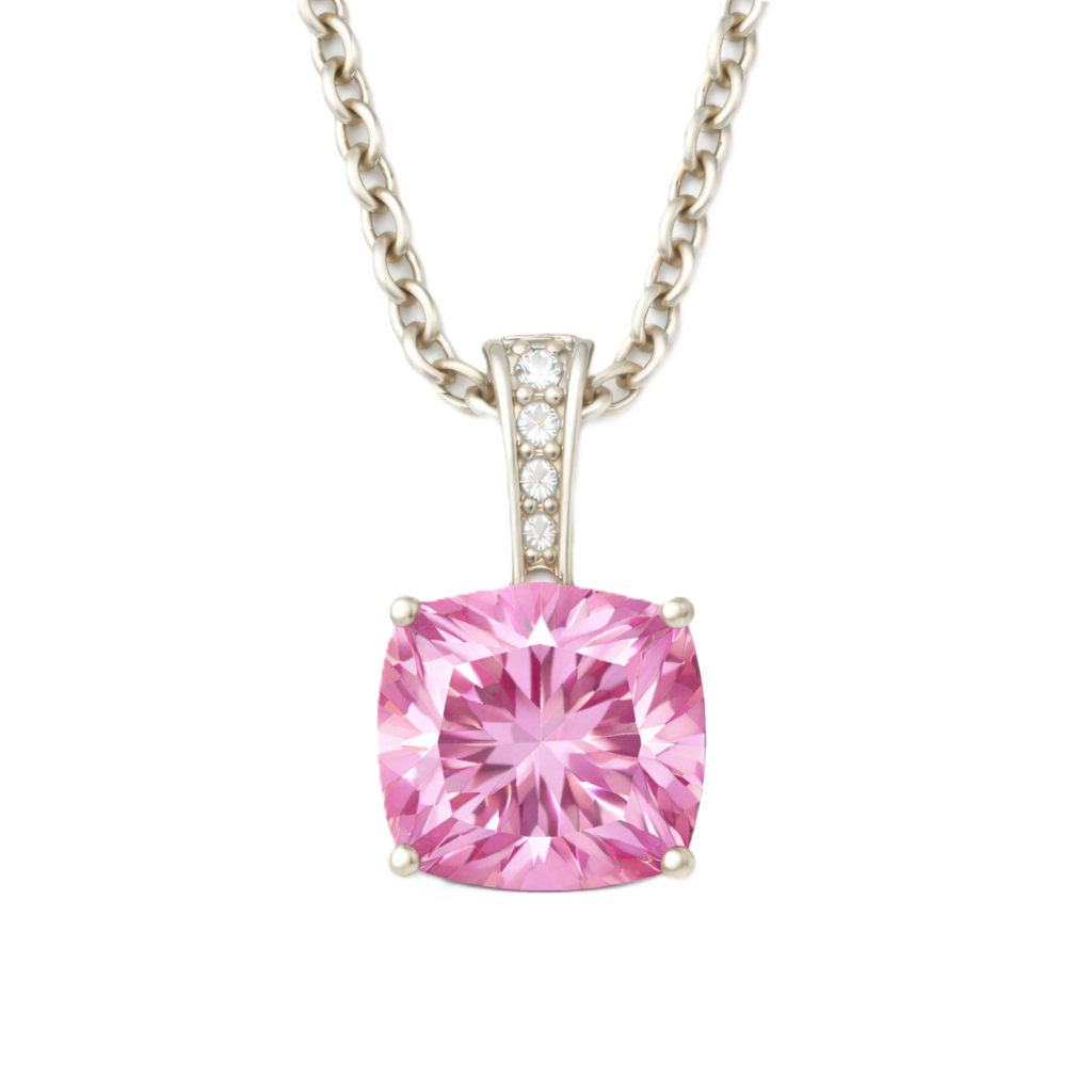 Pink sapphire pendant with a 6 mm cushion gemstone in white gold-plated 925 silver, accented with moissanite. Elegant and refined. Available now at BSI Jewelry.