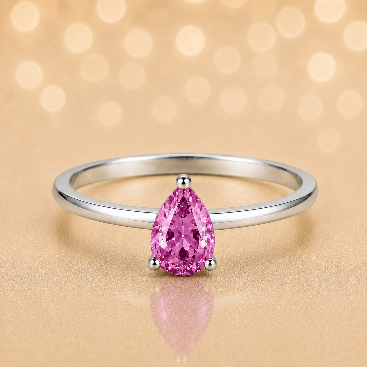 Pink sapphire solitaire ring with a 6×4 mm pear in white gold-plated 925 silver. Elegant, minimal, and timeless for daily wear. Available now at BSI Jewelry.