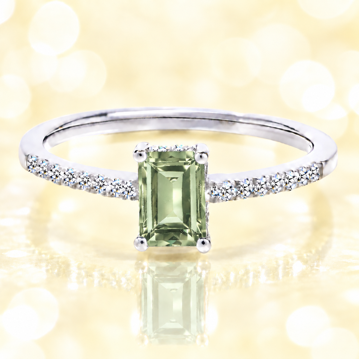 Prasolite ring with a 7×5 mm emerald cut in white gold-plated 925 silver, with moissanite. Elegant and refined for daily wear. Available now at BSI Jewelry.