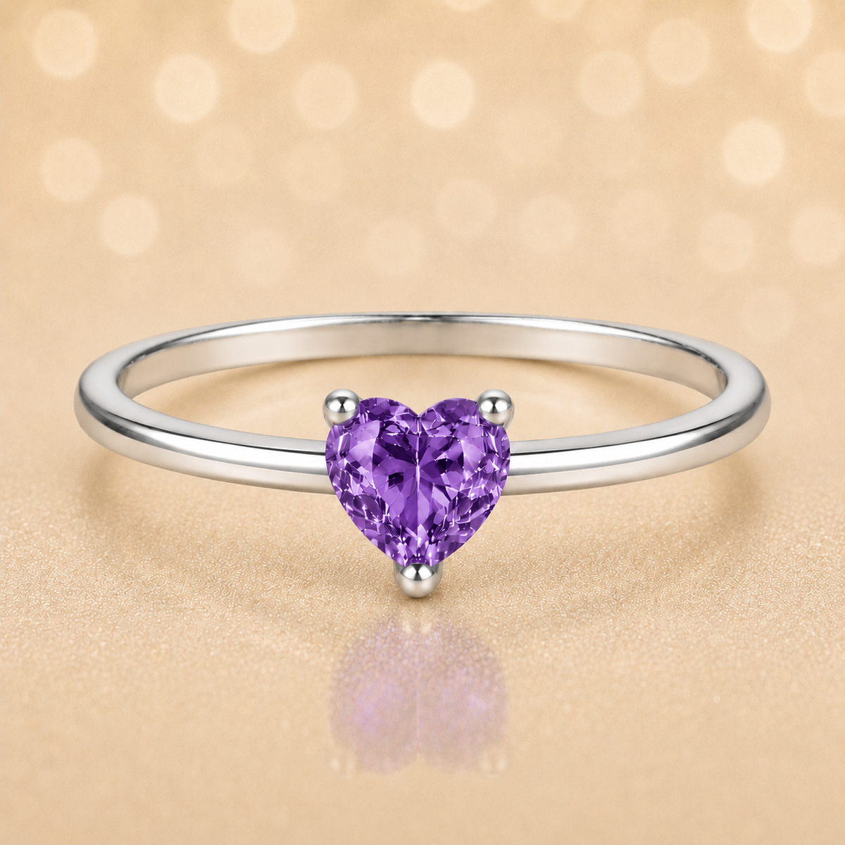 Purple sapphire solitaire ring with a 5 mm heart in white gold-plated 925 silver. Elegant, minimal, and timeless for daily wear. Available now at BSI Jewelry.
