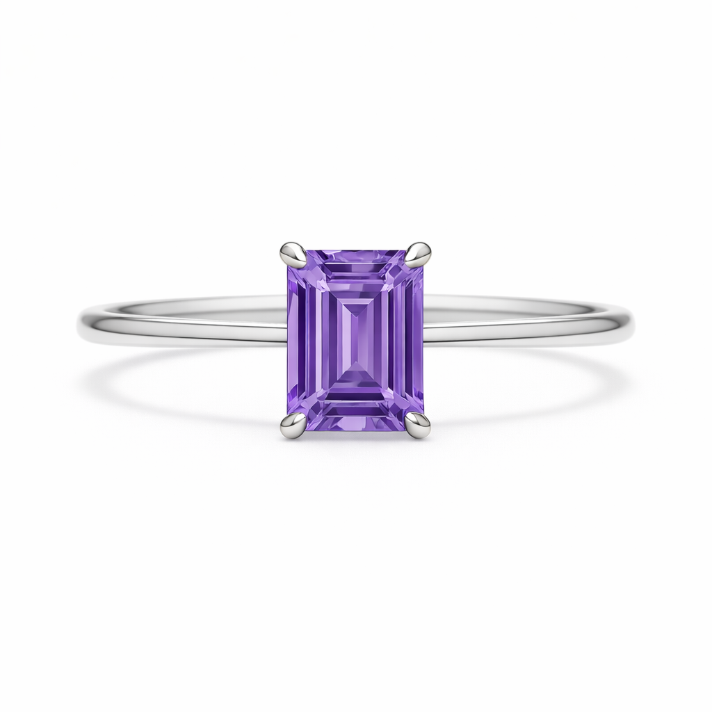 Elegant 6×4 mm emerald-cut purple sapphire ring crafted in white gold-plated 925 silver with palladium alloy. Timeless brilliance. Available now at BSI Jewelry.