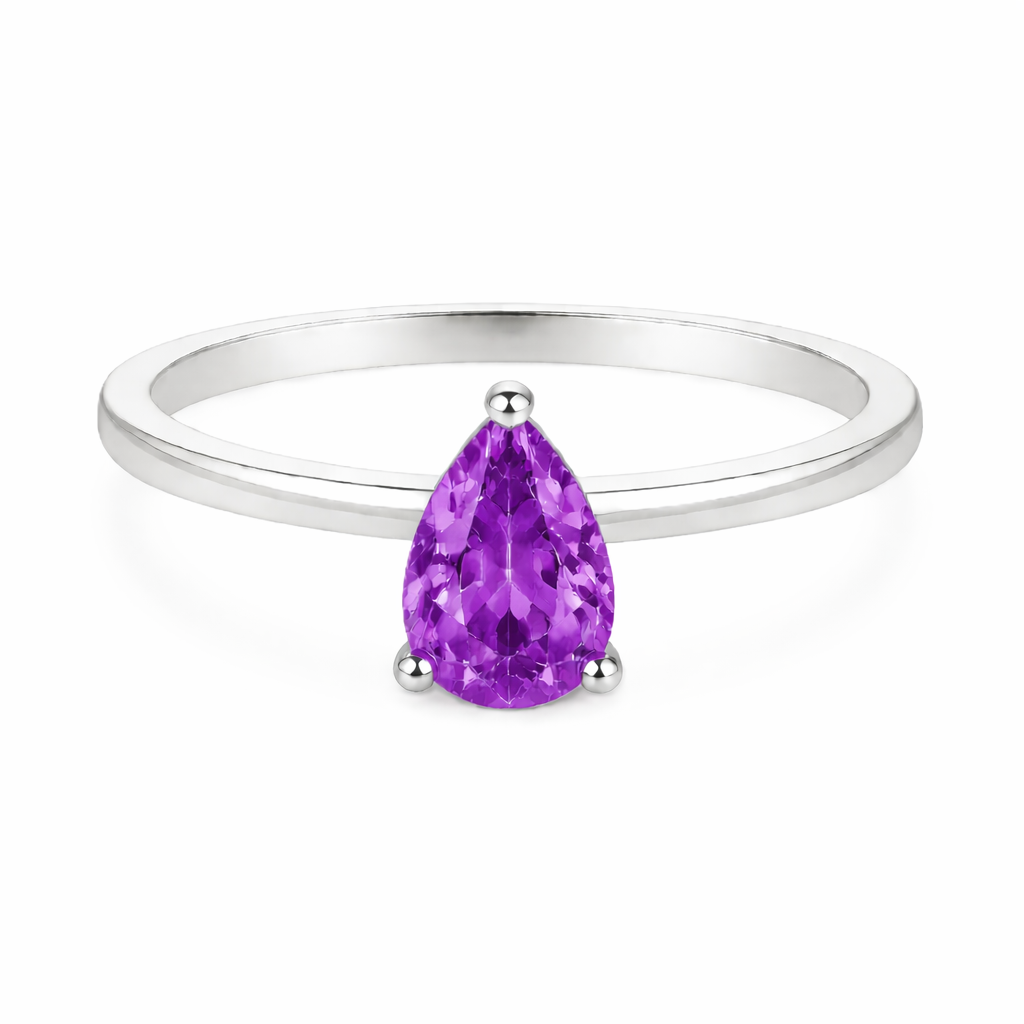 Purple sapphire solitaire ring with a 6×4 mm pear in white gold-plated 925 silver. Elegant, minimal, and timeless for daily wear. Available now at BSI Jewelry.