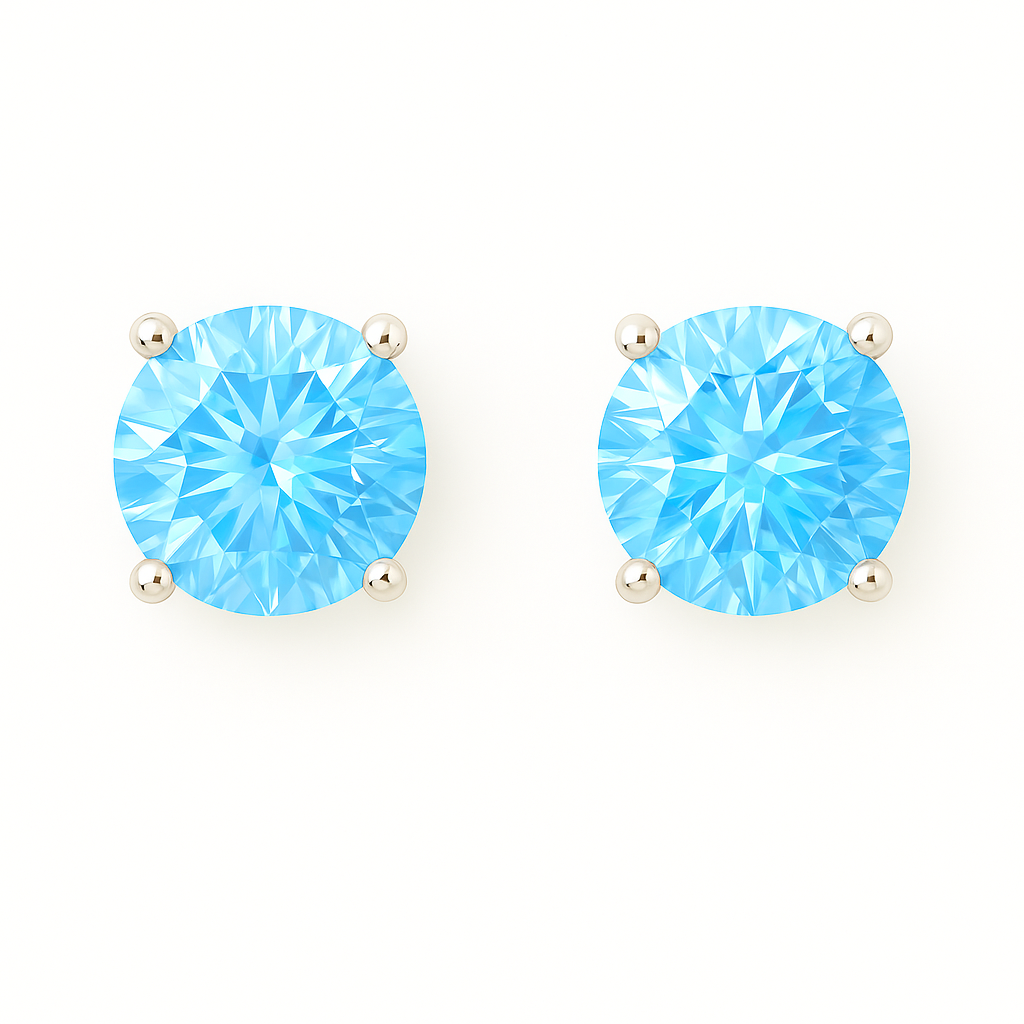 Sky blue topaz stud earrings with 4 mm round cut, crafted in white gold-plated 925 silver and palladium alloy. Elegant sparkle. Available now at BSI Jewelry.