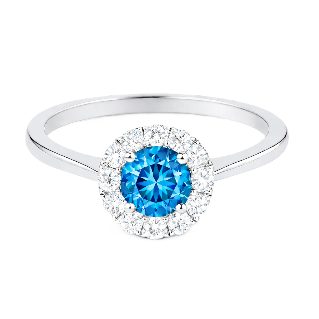 Swiss blue topaz ring with a 4.50 mm round-cut in white gold-plated 925 silver, accented with moissanite for vivid blue brilliance. Available now at BSI Jewelry.