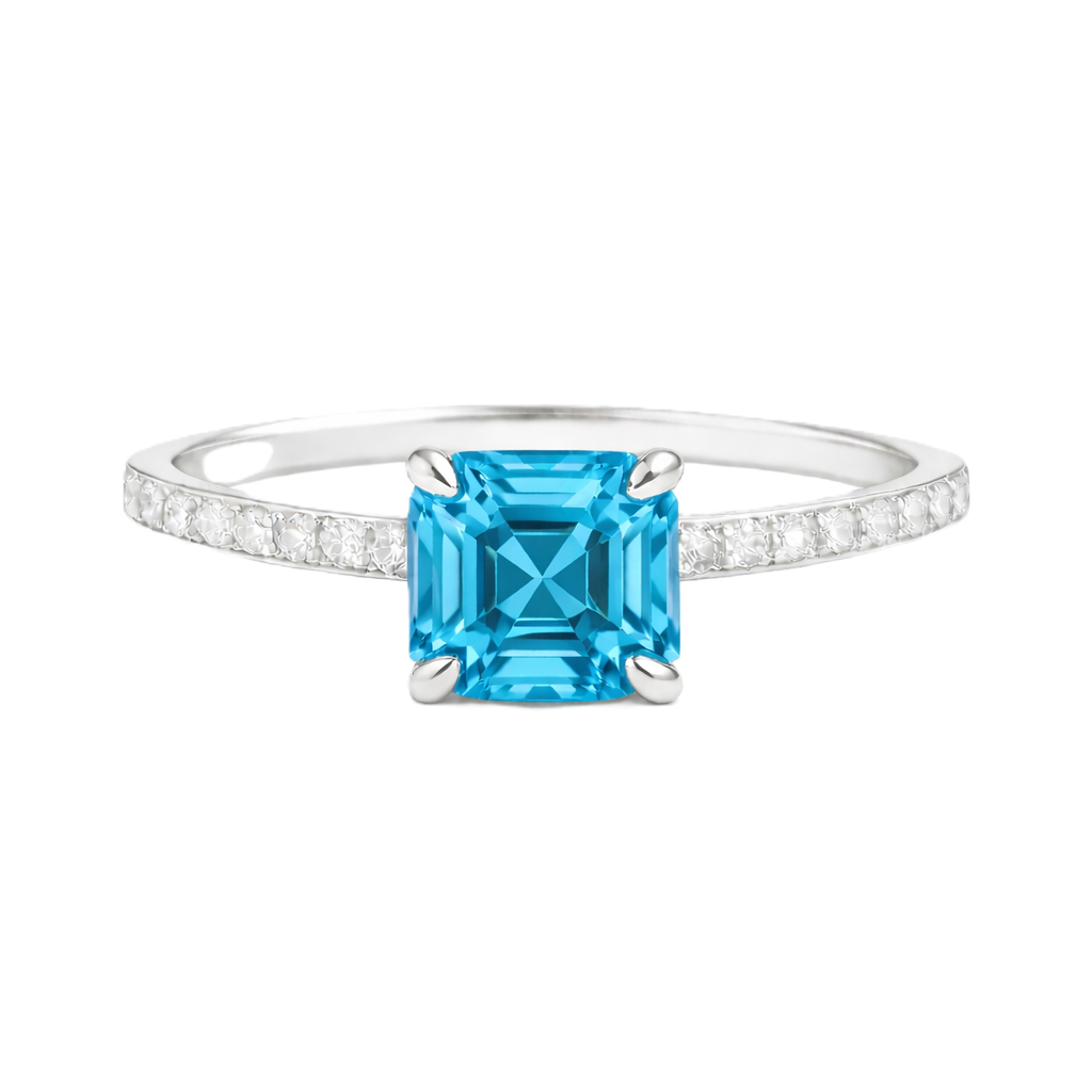 Swiss blue topaz ring with a 6 mm Asscher-cut in white gold-plated 925 silver, accented with moissanite and vivid blue brilliance. Available now at BSI Jewelry.