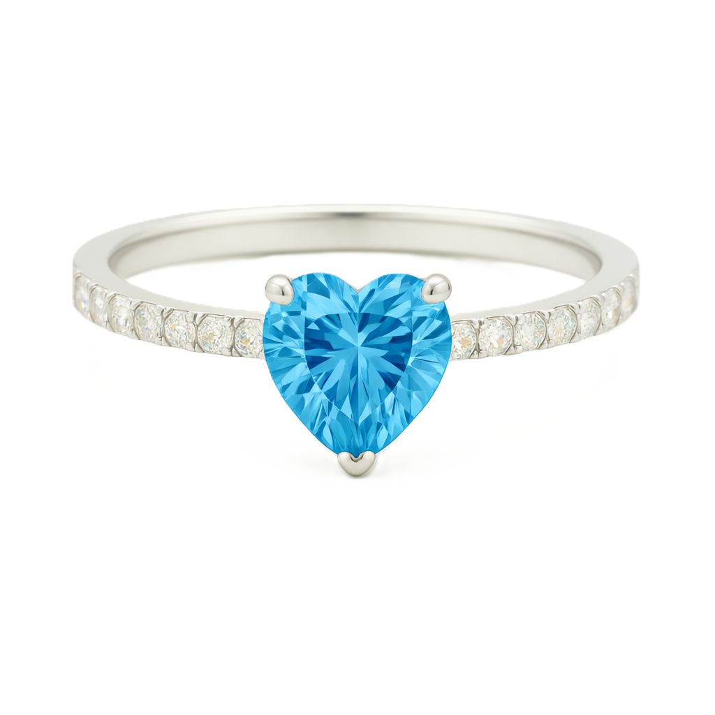 Swiss blue topaz ring with a 6 mm heart in white gold-plated 925 silver, with moissanite. Romantic and elegant for daily wear. Available now at BSI Jewelry.