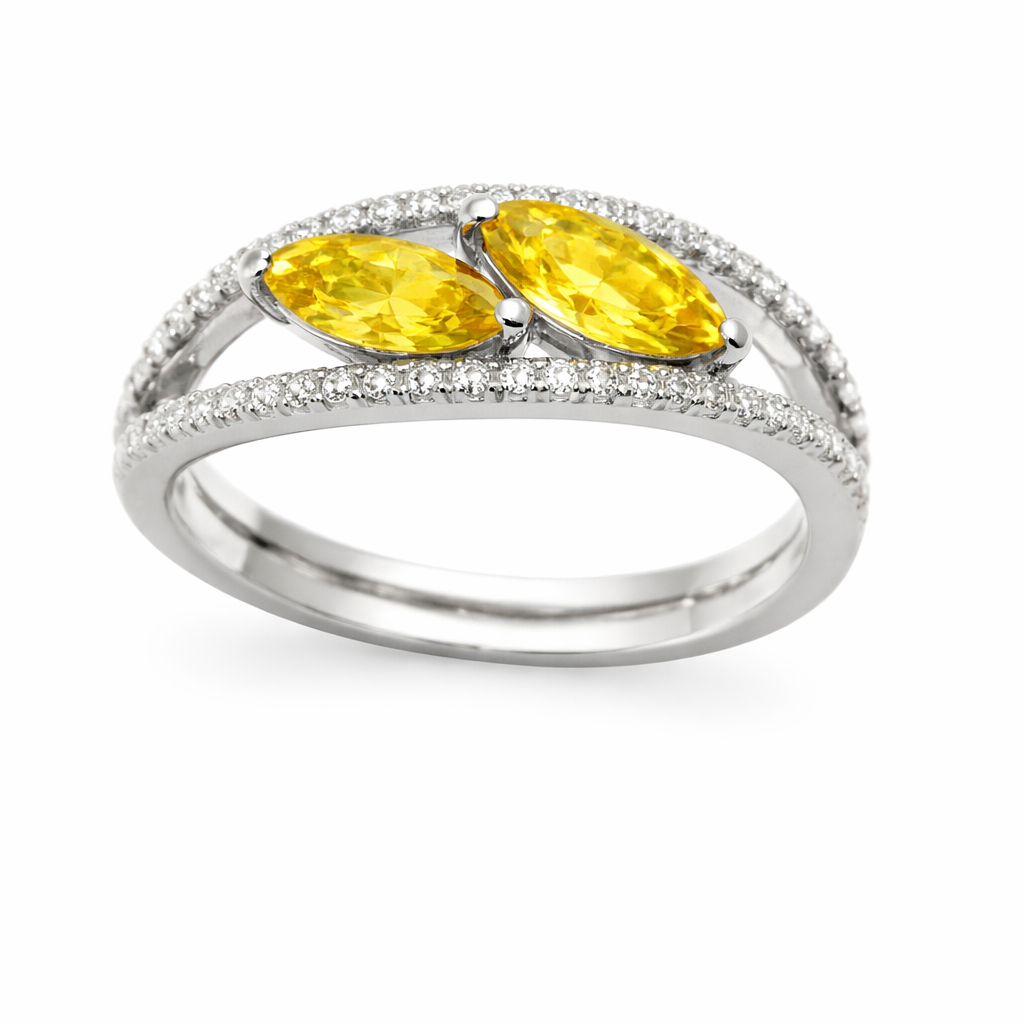 Yellow sapphire crossover ring with 6×3 mm marquise in white gold-plated 925 silver, accented with moissanite. Elegant and contemporary. Available at BSI Jewelry.