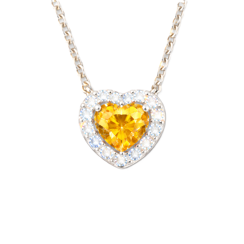Yellow sapphire heart pendant with 6 mm center stone in white gold-plated 925 silver. Radiant and elegant for everyday wear. Available now at BSI Jewelry.
