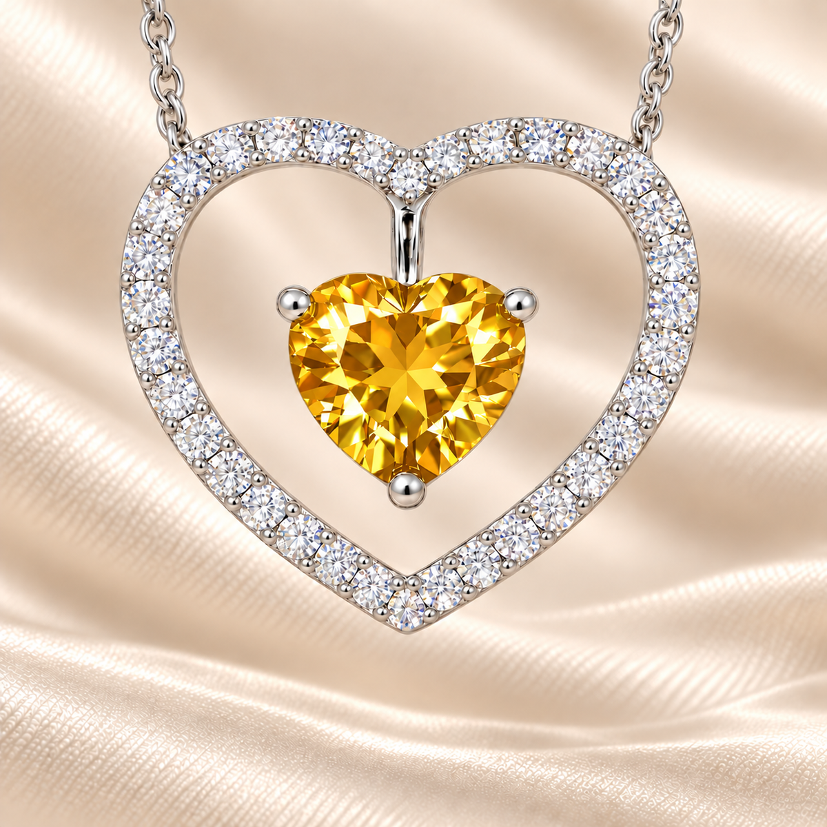 Yellow sapphire necklace with a 6 mm heart cut and moissanite halo, crafted in white gold-plated 925 silver. Elegant and radiant. Available now at BSI Jewelry.
