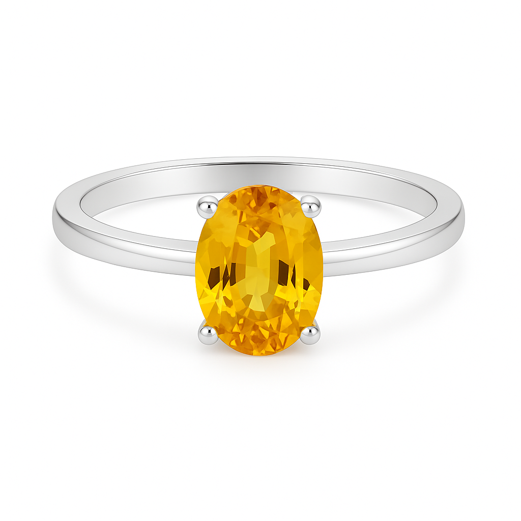 Yellow sapphire oval solitaire ring in white-gold-plated 925 silver. 7×5 mm gemstone with radiant brilliance. Available now at BSI Jewelry.