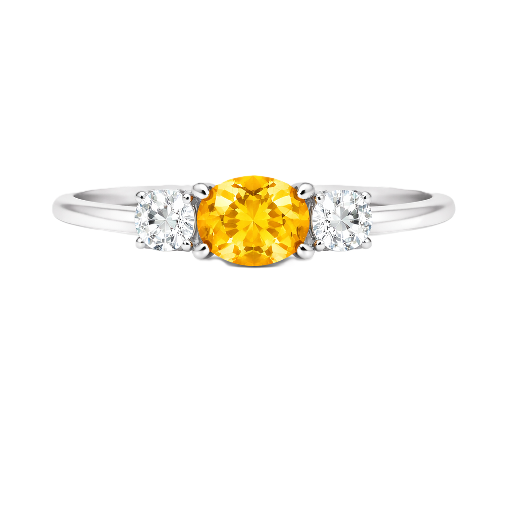 Yellow sapphire ring, 5×4 mm oval with moissanite accents in white gold-plated 925 silver. Bright, elegant, and hypoallergenic. Available now at BSI Jewelry.