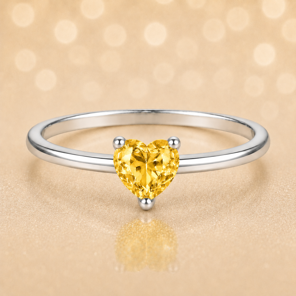 Yellow sapphire solitaire ring with a 5 mm heart in white gold-plated 925 silver. Elegant, minimal, and timeless for daily wear. Available now at BSI Jewelry.