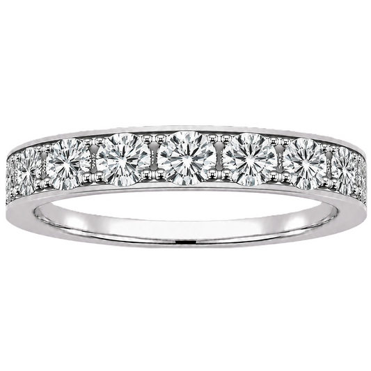 Round moissanite wedding band crafted in white gold-plated 925 silver. Elegant brilliance and timeless sparkle for everyday wear. Available now at BSI Jewelry.