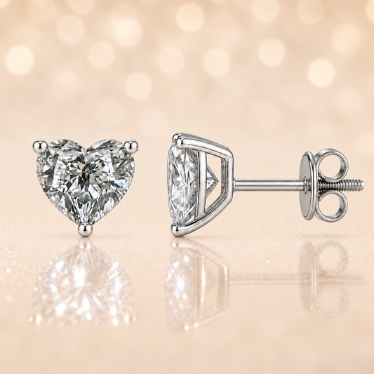 Moissanite Stud Earrings, 6 mm heart cut, crafted in white gold-plated 925 silver with palladium-added alloy. Romantic, and hypoallergenic. Now at BSI Jewelry.