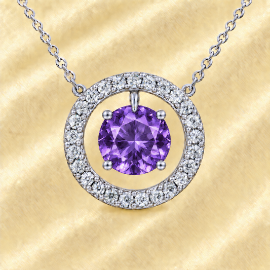 Amethyst necklace with a 6 mm round gemstone and moissanite halo in white gold-plated 925 silver. Elegant and radiant. Available now at BSI Jewelry.